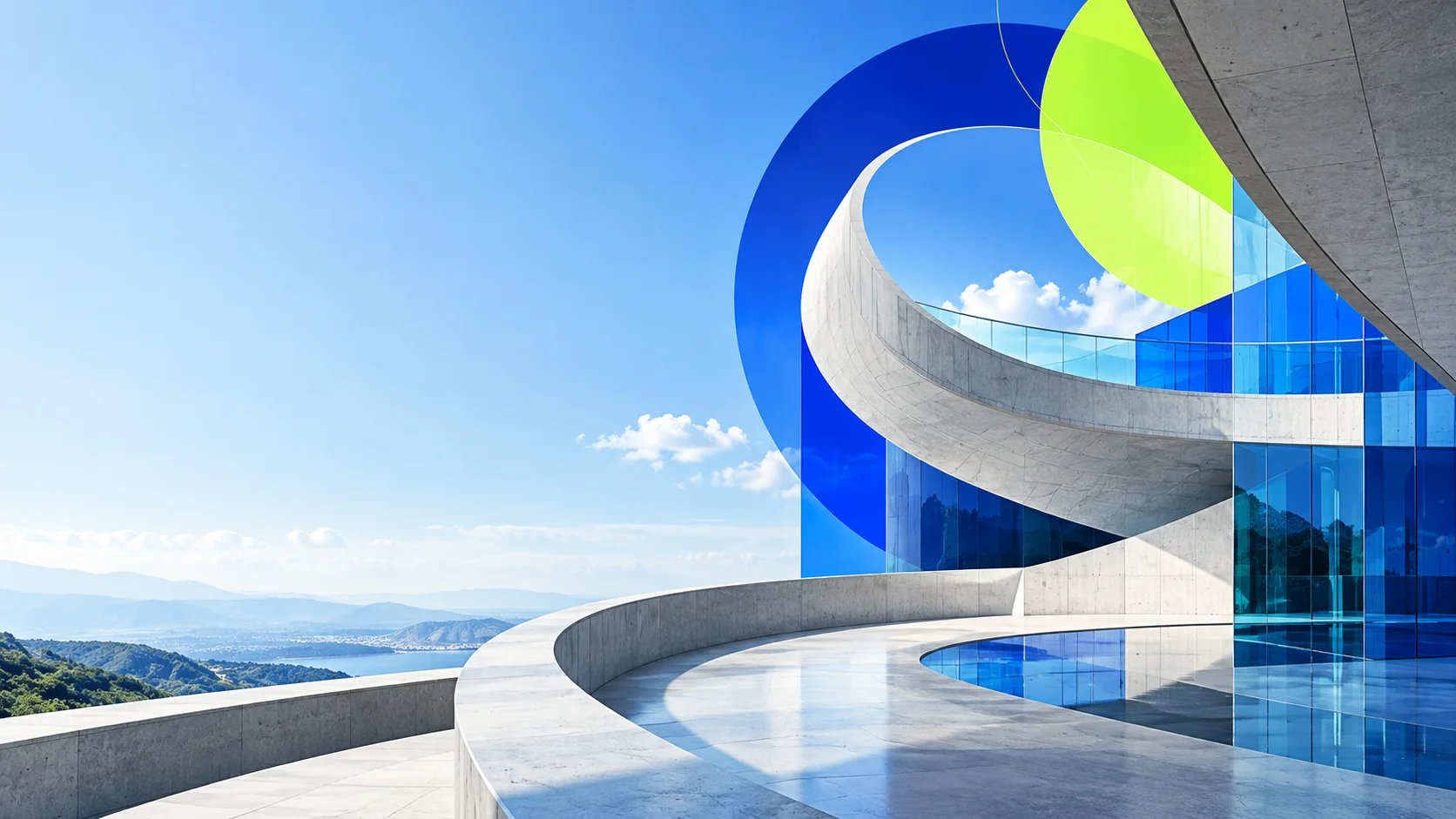 A sunlit concrete terrace above a bay, with a curving concrete spiral framed by royal blue and lime glass shapes